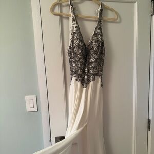 Dress with beaded fabric